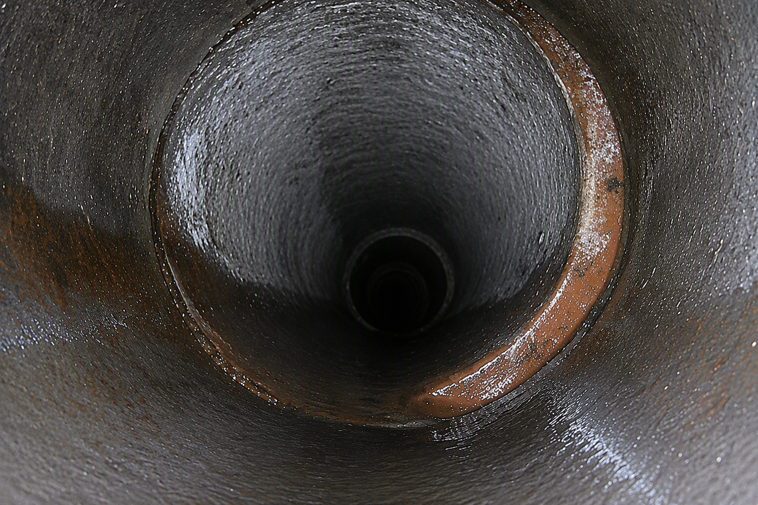 A misaligned sewage pipe